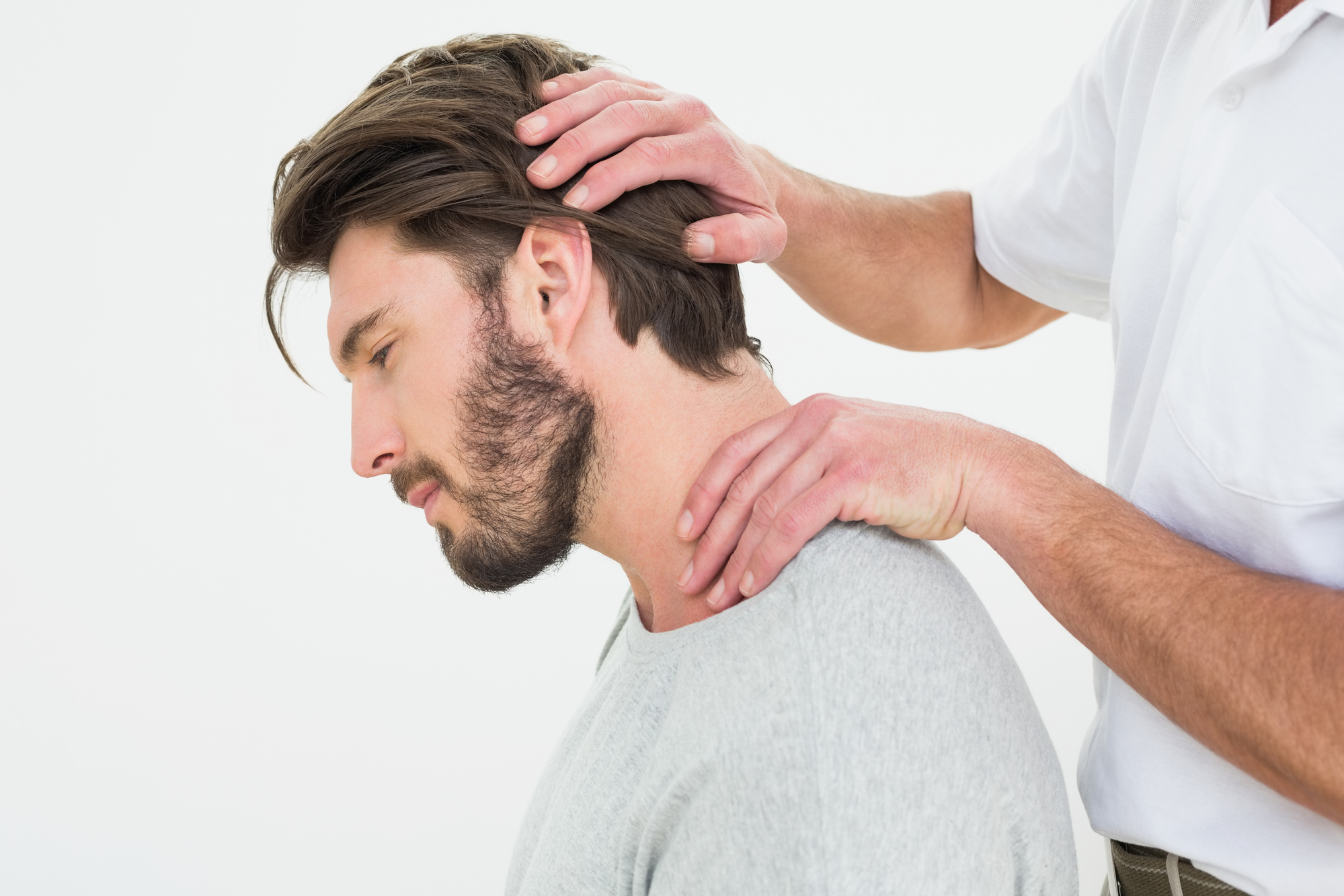 man getting physio for neck pain | valencia physio